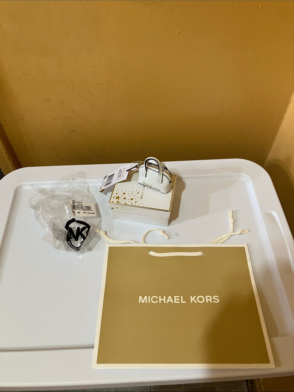 Michael Kors White leather and Gold Mini Purse Charm
